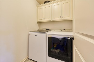 Welcome home to 707 Tomahawk Court! This immaculate, elevated on Paradise Pointe Golf Complex in Missouri - for sale on GolfHomes.com, golf home, golf lot