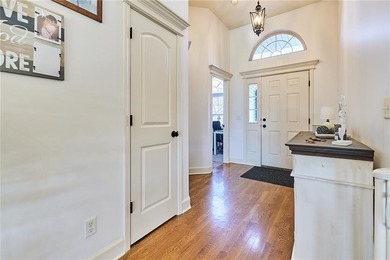 Welcome home to 707 Tomahawk Court! This immaculate, elevated on Paradise Pointe Golf Complex in Missouri - for sale on GolfHomes.com, golf home, golf lot