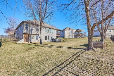 Welcome home to 707 Tomahawk Court! This immaculate, elevated on Paradise Pointe Golf Complex in Missouri - for sale on GolfHomes.com, golf home, golf lot