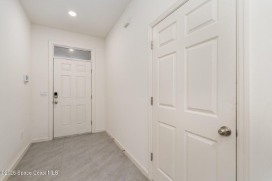Like-New Golf Course Home in Mims! This nearly new single-story on Walkabout Golf and Country Club in Florida - for sale on GolfHomes.com, golf home, golf lot