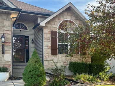 Welcome home to 707 Tomahawk Court! This immaculate, elevated on Paradise Pointe Golf Complex in Missouri - for sale on GolfHomes.com, golf home, golf lot