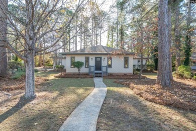 Welcome to 404 Wotan Rd, a fully remodeled 4-bedroom, 2.5-bath on The Woodlands Country Club in South Carolina - for sale on GolfHomes.com, golf home, golf lot