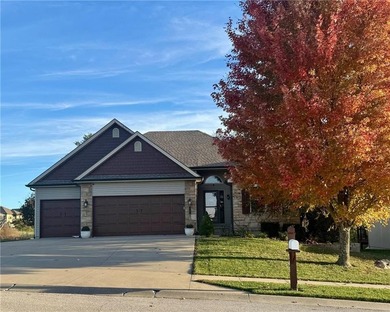 Welcome home to 707 Tomahawk Court! This immaculate, elevated on Paradise Pointe Golf Complex in Missouri - for sale on GolfHomes.com, golf home, golf lot