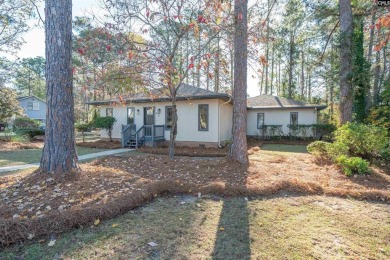 Welcome to 404 Wotan Rd, a fully remodeled 4-bedroom, 2.5-bath on The Woodlands Country Club in South Carolina - for sale on GolfHomes.com, golf home, golf lot