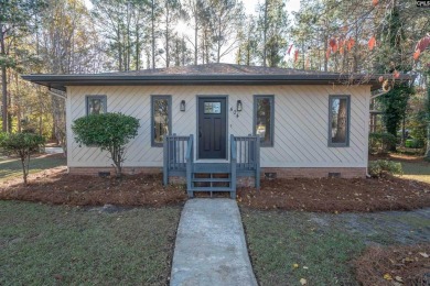 Welcome to 404 Wotan Rd, a fully remodeled 4-bedroom, 2.5-bath on The Woodlands Country Club in South Carolina - for sale on GolfHomes.com, golf home, golf lot