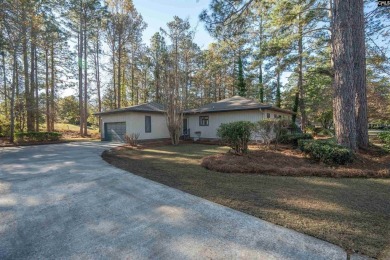 Welcome to 404 Wotan Rd, a fully remodeled 4-bedroom, 2.5-bath on The Woodlands Country Club in South Carolina - for sale on GolfHomes.com, golf home, golf lot