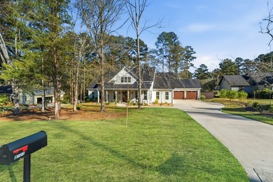 Experience the elegance of this stunning Craftsman-style on Milledgeville Country Club in Georgia - for sale on GolfHomes.com, golf home, golf lot