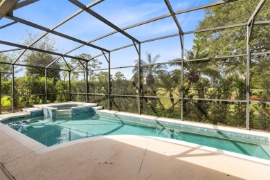 This elegant single-family home in the gated Sandhill Trace on Hunters Creek Golf Course in Florida - for sale on GolfHomes.com, golf home, golf lot