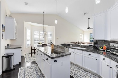 This elegant single-family home in the gated Sandhill Trace on Hunters Creek Golf Course in Florida - for sale on GolfHomes.com, golf home, golf lot