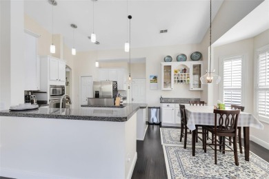 This elegant single-family home in the gated Sandhill Trace on Hunters Creek Golf Course in Florida - for sale on GolfHomes.com, golf home, golf lot