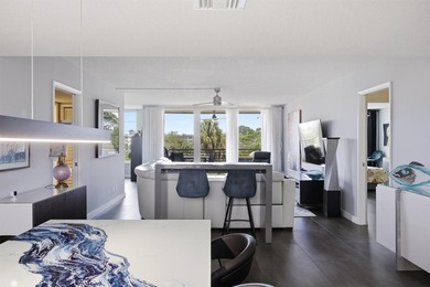 Beautifully updated 2 bedroom, 2 bathroom condo with a den in an on Palm-Aire Country Club and Resort - Palms in Florida - for sale on GolfHomes.com, golf home, golf lot