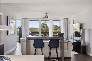 Beautifully updated 2 bedroom, 2 bathroom condo with a den in an on Palm-Aire Country Club and Resort - Palms in Florida - for sale on GolfHomes.com, golf home, golf lot