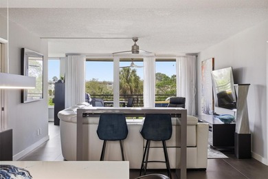 Beautifully updated 2 bedroom, 2 bathroom condo with a den in an on Palm-Aire Country Club and Resort - Palms in Florida - for sale on GolfHomes.com, golf home, golf lot