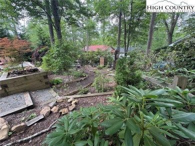 Adorable year-round home on spacious corner lot. One level on Land Harbor Golf Course in North Carolina - for sale on GolfHomes.com, golf home, golf lot