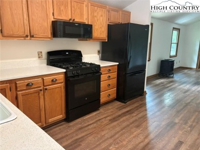Adorable year-round home on spacious corner lot. One level on Land Harbor Golf Course in North Carolina - for sale on GolfHomes.com, golf home, golf lot