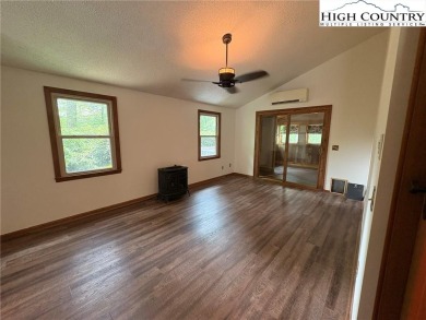 Adorable year-round home on spacious corner lot. One level on Land Harbor Golf Course in North Carolina - for sale on GolfHomes.com, golf home, golf lot