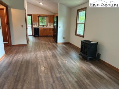 Adorable year-round home on spacious corner lot. One level on Land Harbor Golf Course in North Carolina - for sale on GolfHomes.com, golf home, golf lot