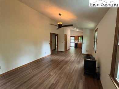 Adorable year-round home on spacious corner lot. One level on Land Harbor Golf Course in North Carolina - for sale on GolfHomes.com, golf home, golf lot