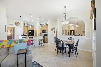 Stunning lake and golf course views from this beautifully on Grand Haven Golf Club in Florida - for sale on GolfHomes.com, golf home, golf lot