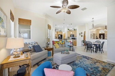 Stunning lake and golf course views from this beautifully on Grand Haven Golf Club in Florida - for sale on GolfHomes.com, golf home, golf lot