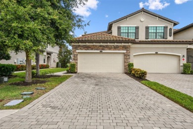 This beautiful end-unit Coach home offers breathtaking views of on Lakewood National Golf Club in Florida - for sale on GolfHomes.com, golf home, golf lot