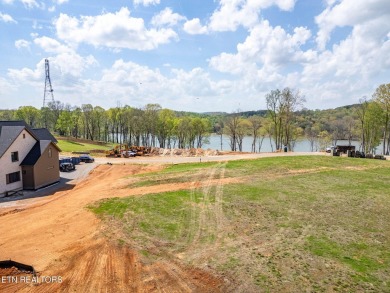 A lake view lot at an unbeatable price! Discover the essence of on Tennessee National Golf Club in Tennessee - for sale on GolfHomes.com, golf home, golf lot