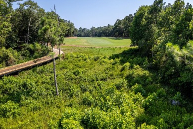 Nestled within the secure, gated community of Wild Heron, you'll on Sharks Tooth Golf Club in Florida - for sale on GolfHomes.com, golf home, golf lot