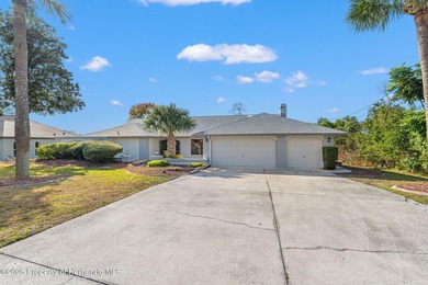 Welcome to this beautifully updated 3-bedroom, 2-bath, 3-car on Oak Hills Country Club in Florida - for sale on GolfHomes.com, golf home, golf lot