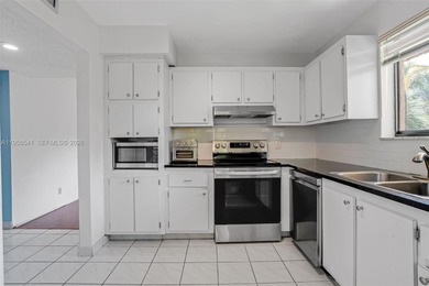 Discover your new home in Weston: spacious 2/2, partially on Bonaventure Country Club in Florida - for sale on GolfHomes.com, golf home, golf lot