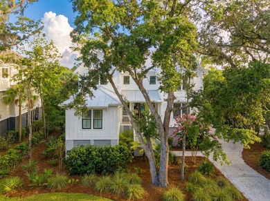 Completed in 2022, this custom creek and marsh front residence on Charleston National Golf Club in South Carolina - for sale on GolfHomes.com, golf home, golf lot