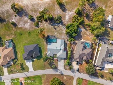 Welcome to this beautifully updated 3-bedroom, 2-bath, 3-car on Oak Hills Country Club in Florida - for sale on GolfHomes.com, golf home, golf lot