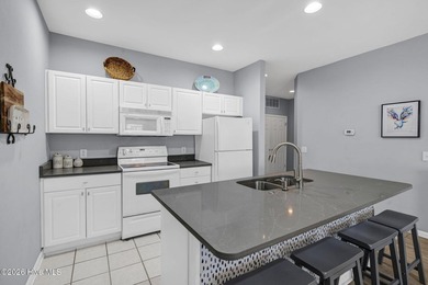 Experience the pinnacle of coastal living in this elegant on Sea Trail Golf Resort in North Carolina - for sale on GolfHomes.com, golf home, golf lot