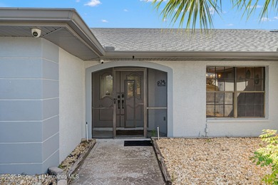 Welcome to this beautifully updated 3-bedroom, 2-bath, 3-car on Oak Hills Country Club in Florida - for sale on GolfHomes.com, golf home, golf lot