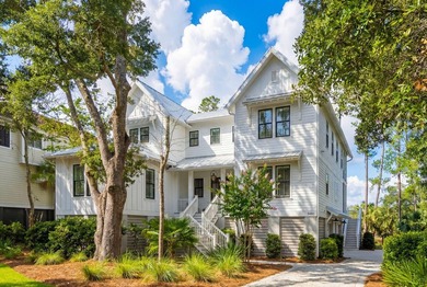 Completed in 2022, this custom creek and marsh front residence on Charleston National Golf Club in South Carolina - for sale on GolfHomes.com, golf home, golf lot