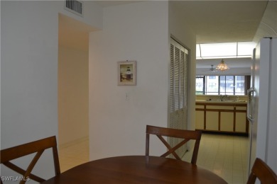 Welcome to this desirable all original first-floor condo in on Riviera Golf Club in Florida - for sale on GolfHomes.com, golf home, golf lot