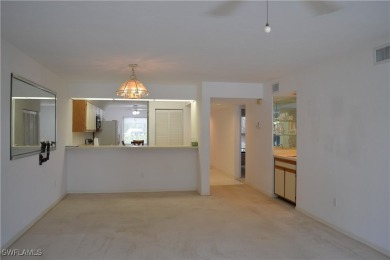 Welcome to this desirable all original first-floor condo in on Riviera Golf Club in Florida - for sale on GolfHomes.com, golf home, golf lot