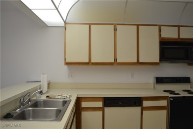 Welcome to this desirable all original first-floor condo in on Riviera Golf Club in Florida - for sale on GolfHomes.com, golf home, golf lot