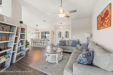 Welcome to this beautifully updated 3-bedroom, 2-bath, 3-car on Oak Hills Country Club in Florida - for sale on GolfHomes.com, golf home, golf lot