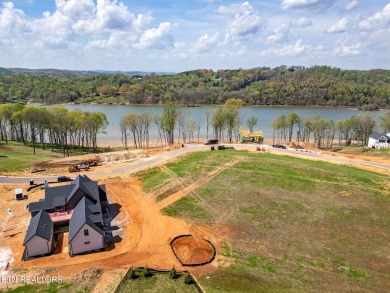 A lake view lot at an unbeatable price! Discover the essence of on Tennessee National Golf Club in Tennessee - for sale on GolfHomes.com, golf home, golf lot