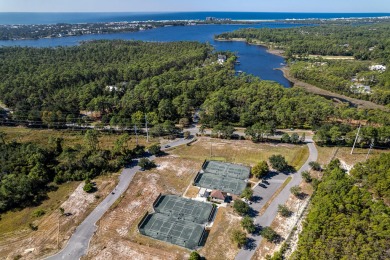 Nestled within the secure, gated community of Wild Heron, you'll on Sharks Tooth Golf Club in Florida - for sale on GolfHomes.com, golf home, golf lot