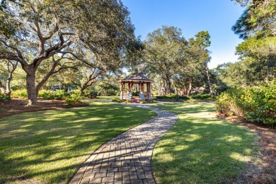 Nestled within the secure, gated community of Wild Heron, you'll on Sharks Tooth Golf Club in Florida - for sale on GolfHomes.com, golf home, golf lot