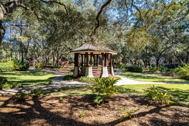 Nestled within the secure, gated community of Wild Heron, you'll on Sharks Tooth Golf Club in Florida - for sale on GolfHomes.com, golf home, golf lot