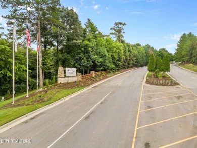 A lake view lot at an unbeatable price! Discover the essence of on Tennessee National Golf Club in Tennessee - for sale on GolfHomes.com, golf home, golf lot