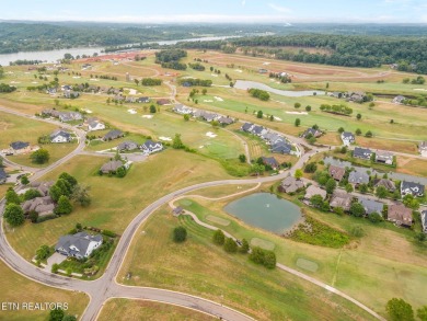 A lake view lot at an unbeatable price! Discover the essence of on Tennessee National Golf Club in Tennessee - for sale on GolfHomes.com, golf home, golf lot