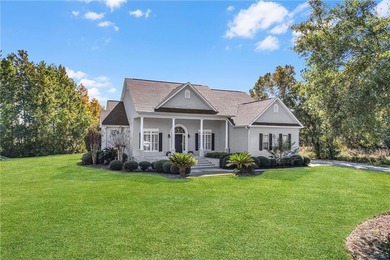 This three bedroom, two and one-half bath home with a marshview on Sapelo Hammock Golf Club in Georgia - for sale on GolfHomes.com, golf home, golf lot