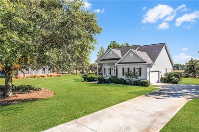 This three bedroom, two and one-half bath home with a marshview on Sapelo Hammock Golf Club in Georgia - for sale on GolfHomes.com, golf home, golf lot