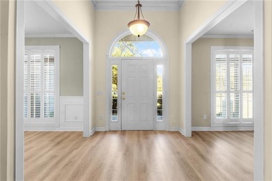 This three bedroom, two and one-half bath home with a marshview on Sapelo Hammock Golf Club in Georgia - for sale on GolfHomes.com, golf home, golf lot