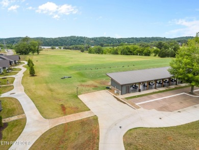 A lake view lot at an unbeatable price! Discover the essence of on Tennessee National Golf Club in Tennessee - for sale on GolfHomes.com, golf home, golf lot