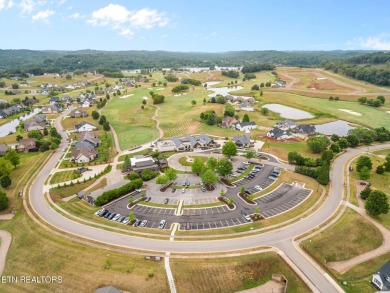 A lake view lot at an unbeatable price! Discover the essence of on Tennessee National Golf Club in Tennessee - for sale on GolfHomes.com, golf home, golf lot