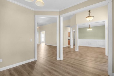 This three bedroom, two and one-half bath home with a marshview on Sapelo Hammock Golf Club in Georgia - for sale on GolfHomes.com, golf home, golf lot